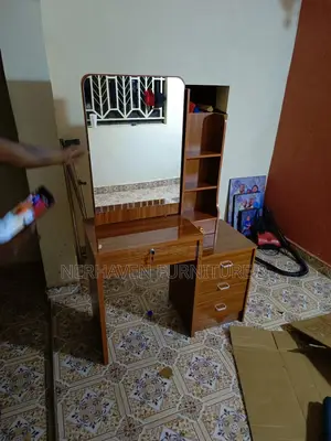 Stylish Brown Dressing Table With Sliding Mirror Door Drawers