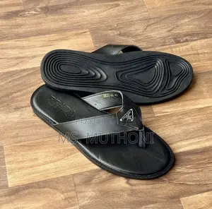 Black Prada Quilted Nappa Leather Slide Sandals.