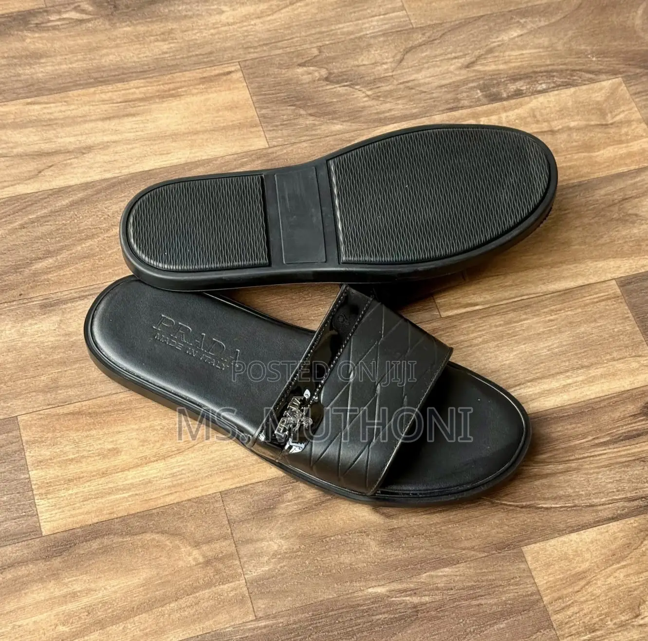 Black Prada Quilted Nappa Leather Slide Sandals.