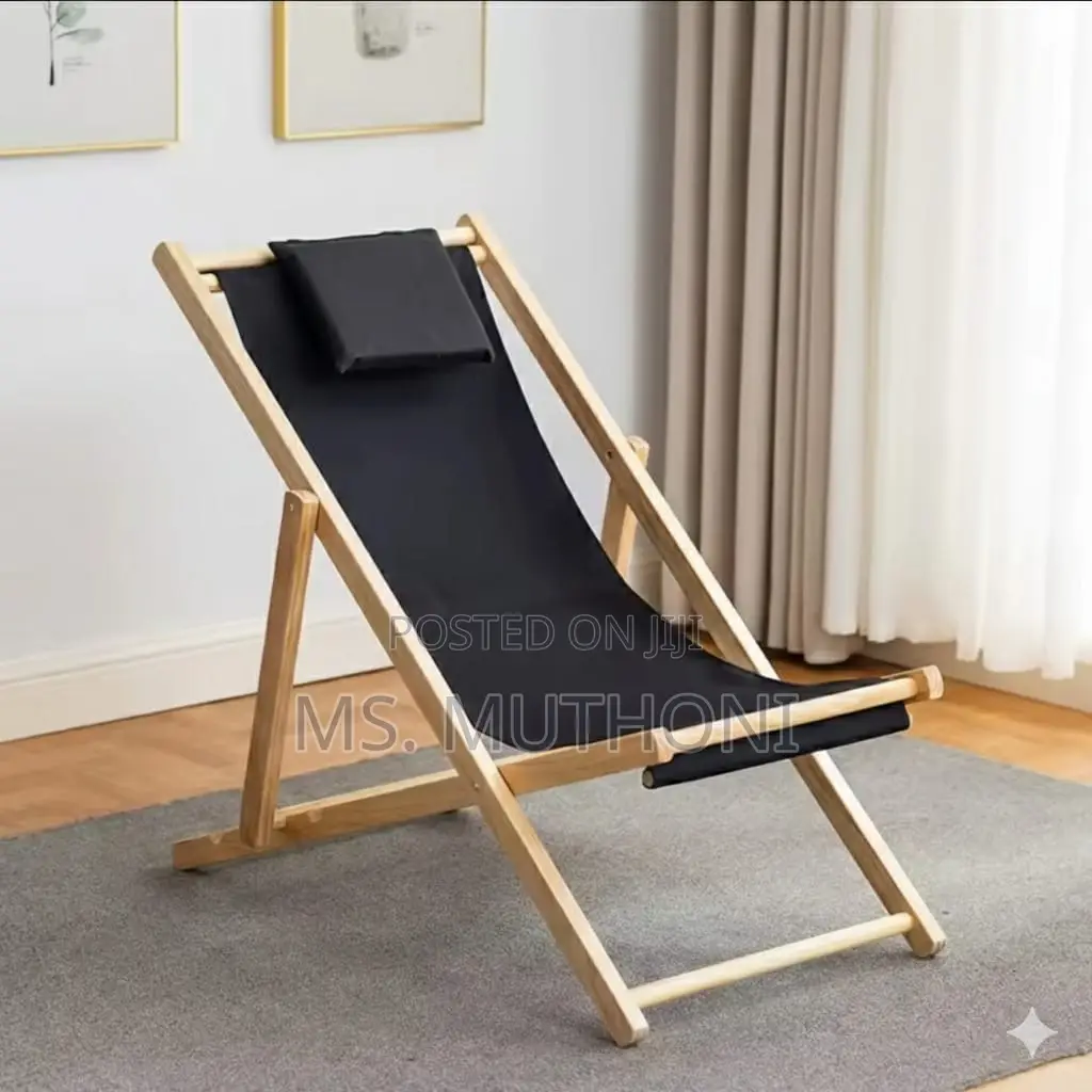 Black Canvas and Solid Wood Adjustable Folding Beach Sling Chair.