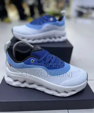 On Cloudtilt Running Shoe in the "Aqua/Iron" Blue White Colorway.