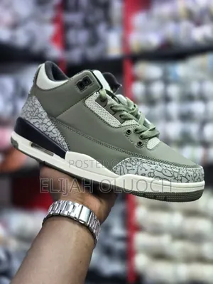 Air Jordan 3 Retro "Medium Olive" Sneakers.