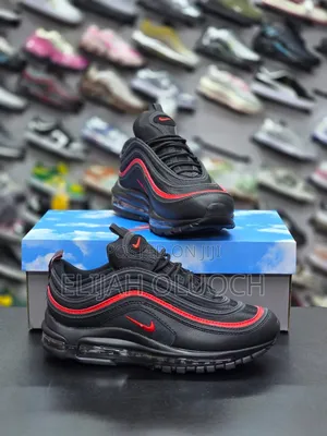 ￼

￼

This Is A Pair Of Nike Air Max 97s In A Black And Red