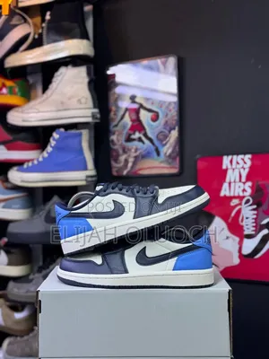 Jordan 1 Low “Obsidian/University Blue-sail”