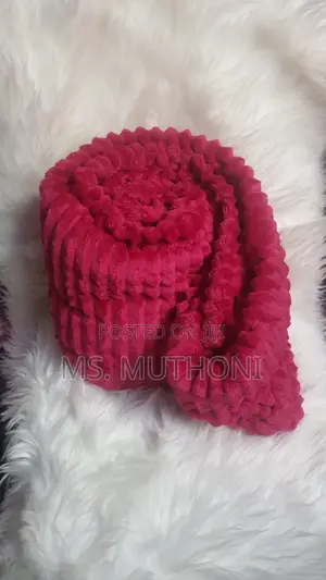 Bedsure Fleece Throw Blanket With a 3d Textured Striped Pattern.
