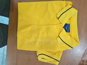 Yellow, With Black Stripes on the Collar and Cuffs.
