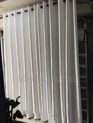Beautiful White Curtains for a Bright Sitting Room
