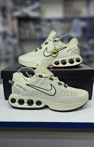 Nike Air Max Dn2 Sneaker In A Cream And Black