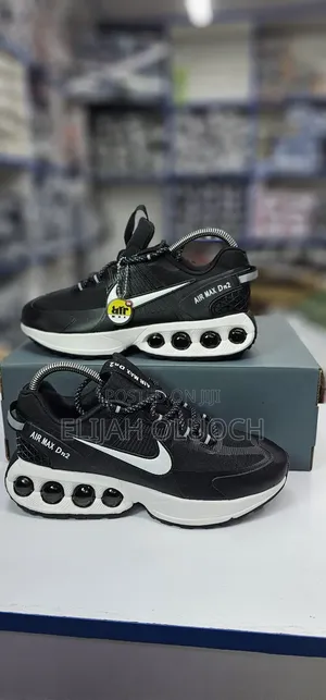 Nike Air Max Dn2 Sneaker In A Cream And Black