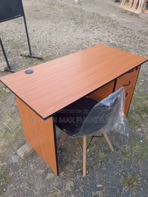 Office Desk and a Black Eames Chair