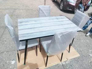 Top Glass Dinning Set 4sitter Dining Table