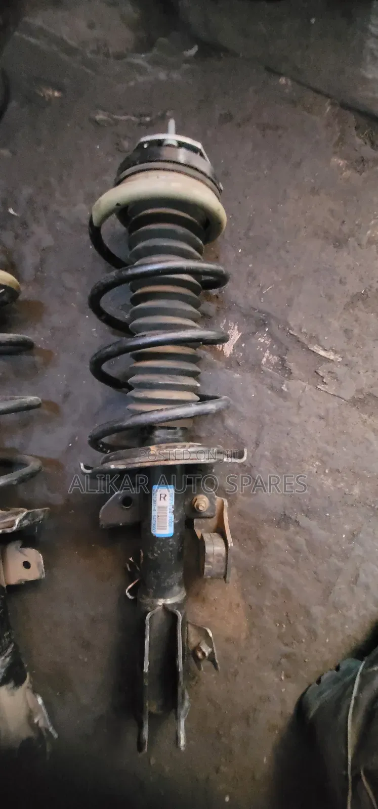 Mazda Demio Front Shock