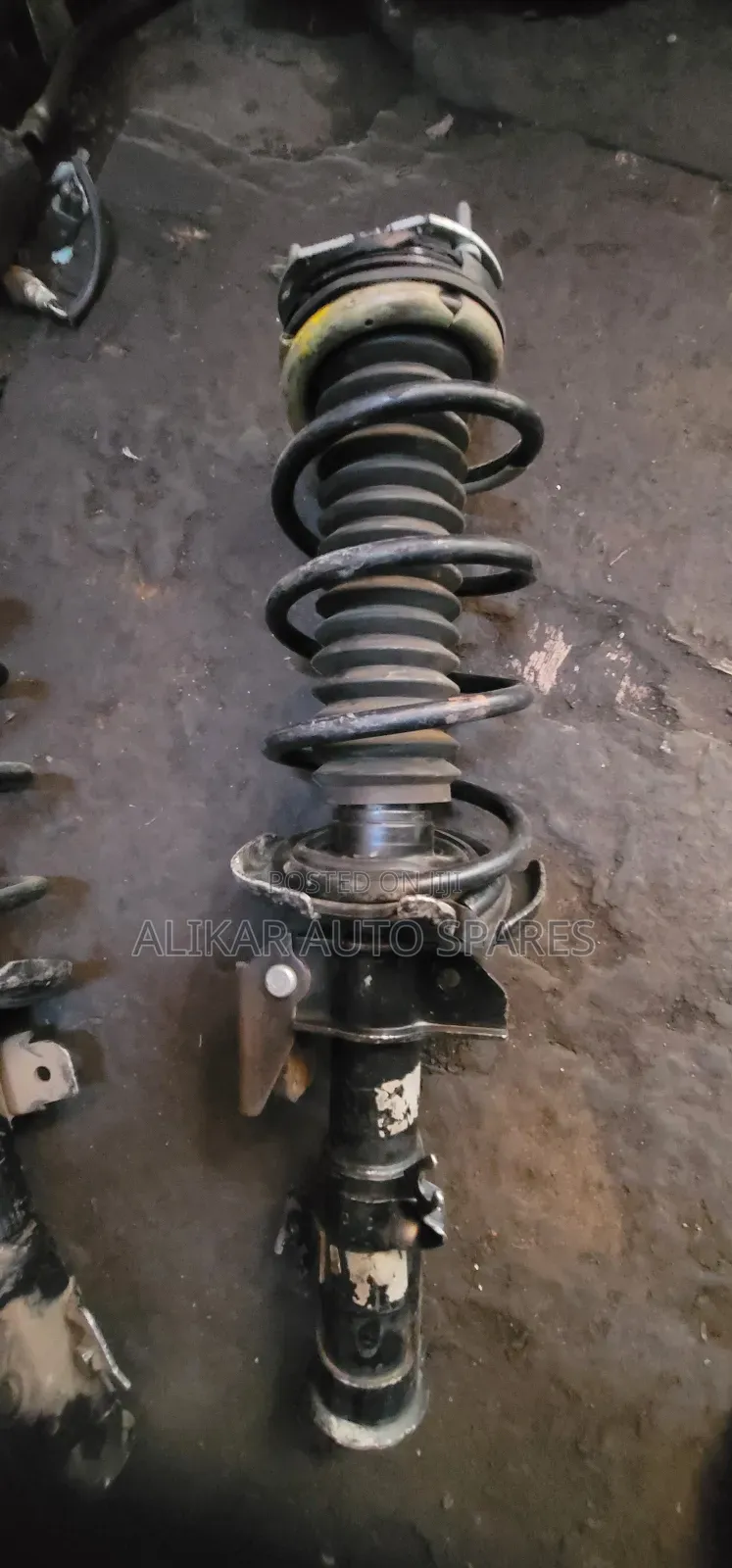 Mazda Demio Front Shock