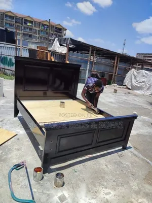 Sleek Black Panel Bed