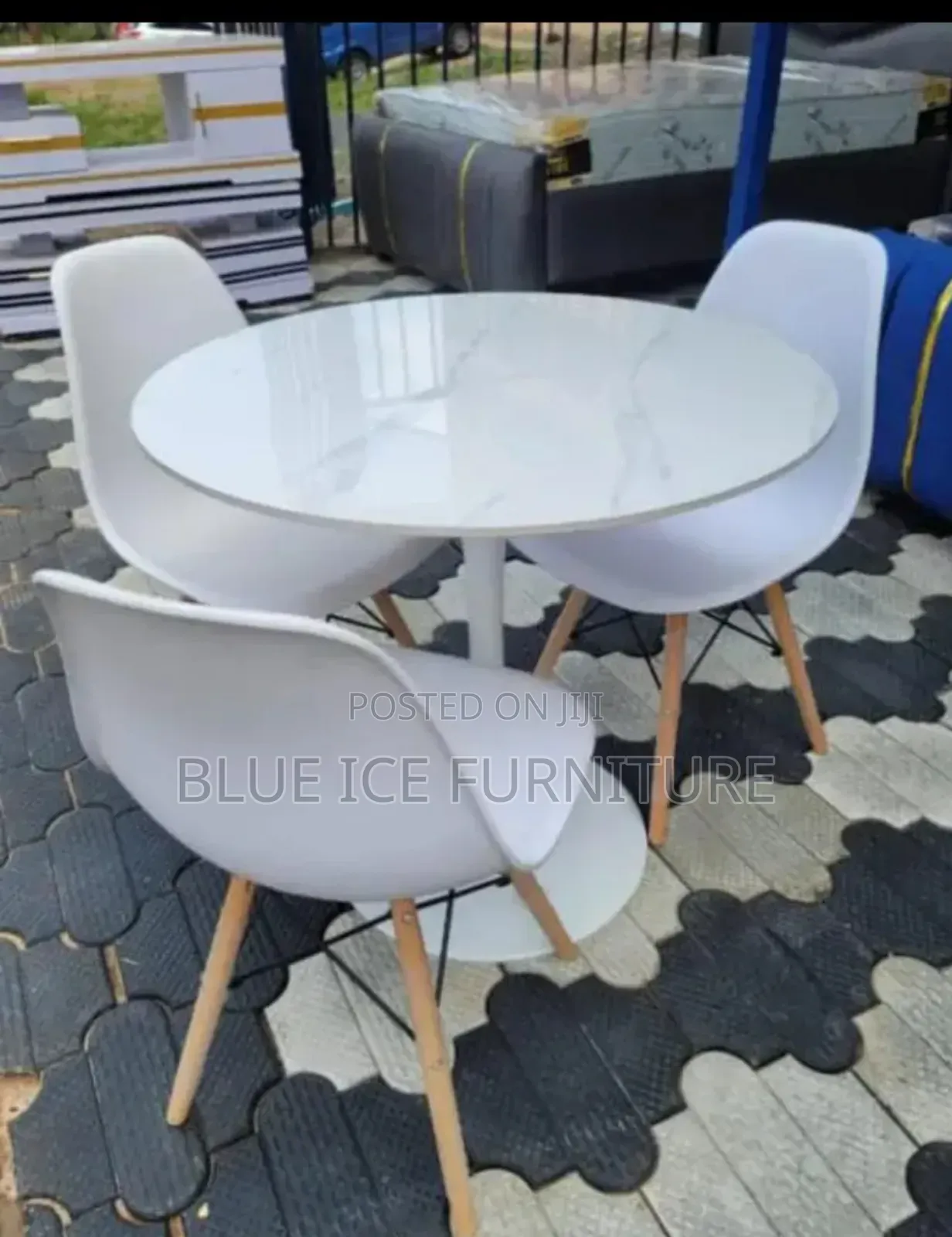 Marble Dining Table With White Eames Chair