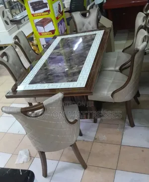 Top-notch 6 Seater Dining Table Set With Quality Wooden Stands.