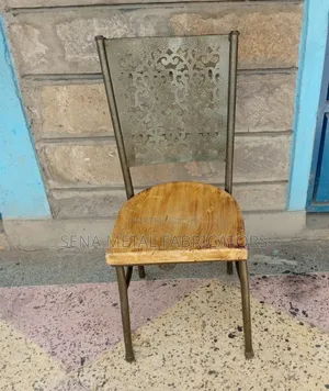 Restaurant Chair With Laser-Cut Designs and Durable Wooden Seat.