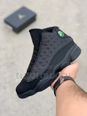 Air Jordan 13 Retro "Black Cat" Sneakers.