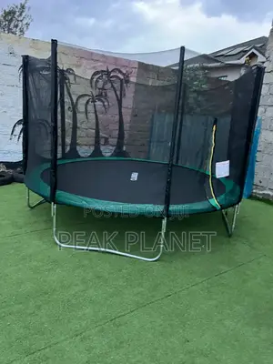 Children Jumping Trampoline