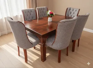Dining Table Set an Upholstered Dining Table With Matching Grey Chairs