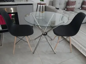Plastic Eames Chair and Round Dining Table