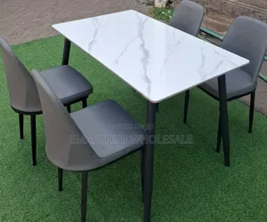 4 Seaters Glass Topping Dinning Table With Executive Chairs