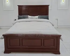 Lounging Wooden 5 by 6 Bed