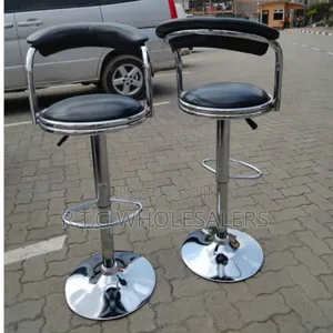 Modern Height‐Adjustable Bar Stool With Footrest