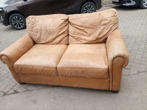 Laura Ashley Leather Sofa.