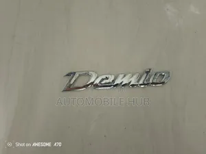 Demio Chrome Emblem Logo – Genuine Mazda Demio Rear Badge