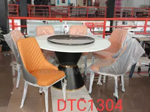 Round Marble Glass Top Six Sitter Dinning Table With Executive Chair