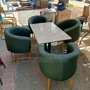 Double Leg Restaurant Table With Green Chairs