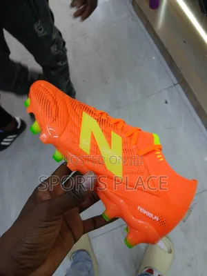 New Balance Tekela Hot Mango Elite Football Boots