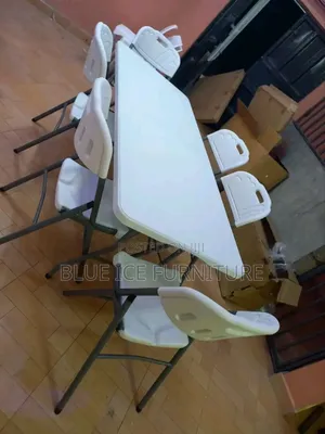 White Foldable Dining Table and Chairs