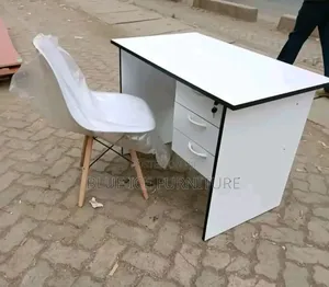 Modern Office Desk With White Plastic Eames Chair