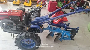 Hand/Walking Tractor With Attachments.