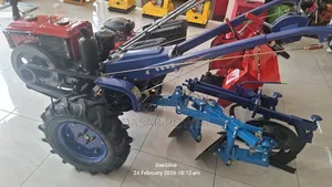 Hand/Walking Tractor With Attachments.