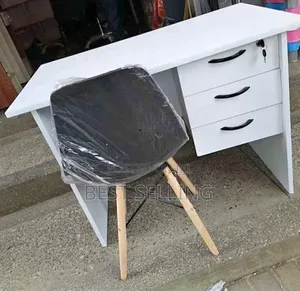 White Office Desk and Eams Chair