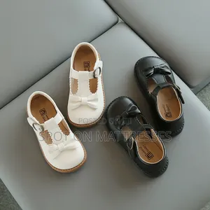 Demure! Girls' Shoes Sizes 21-30. Cream & Black. Delivery Available.