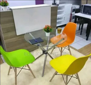 Transparent Glass Table With Eames Chair