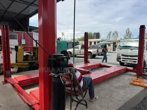 Best Quality and Durable 4t Four Post Vehicle Lift Machine Sunshine