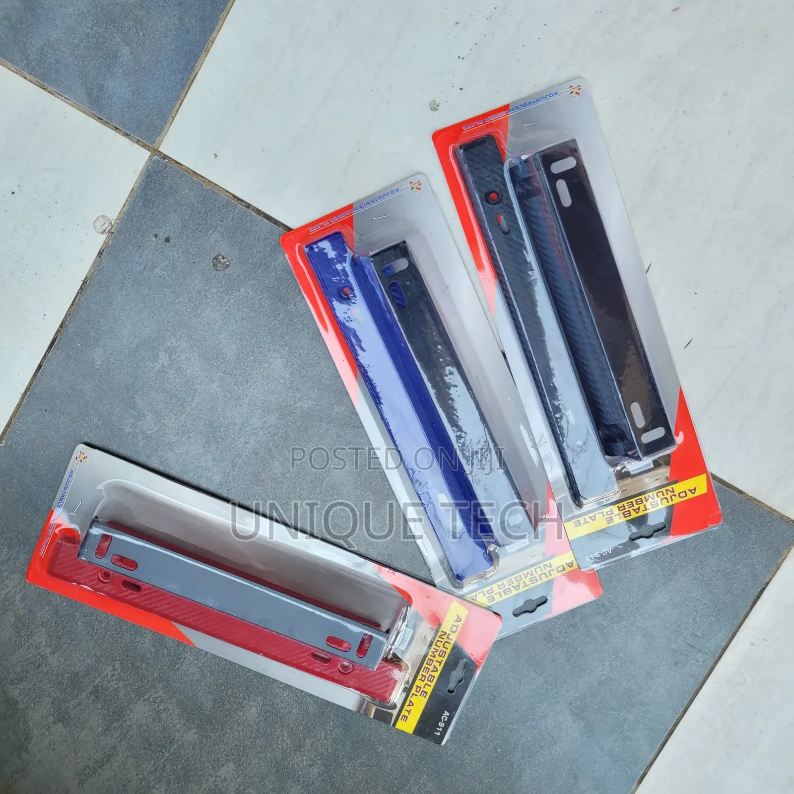 Universal Tilting License Plate Holder