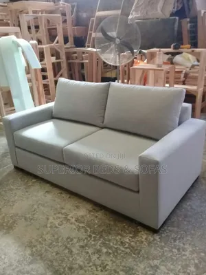 Cream White 2-Seater Sofa.