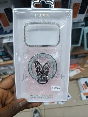 iPhone 17 Pro, a Decorative Ring Stand With a Butterfly Design.