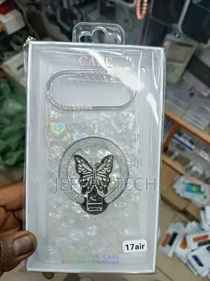 Phone Case for an iPhone 17 Air a Silver Butterfly Design and Glitter