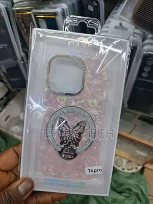 Pink Glittery Case With a Butterfly Kickstand for an iPhone 14 Pro.