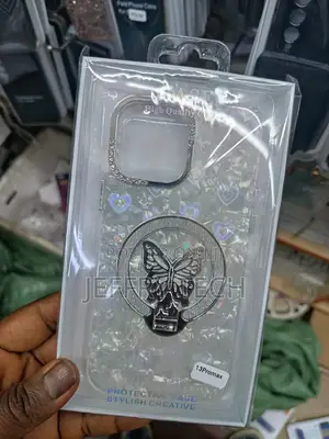 iPhone 13 Pro Max Phone Is a Glittery Cover a Butterfly-Shaped Ring