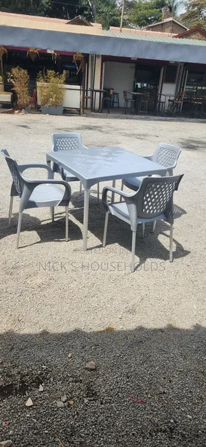 Silver Plastic Table With Metal Legs + Plastic Chairs With Metal Legs