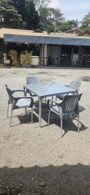 4 Quality Plastic Chairs for Hotel With a Table Set