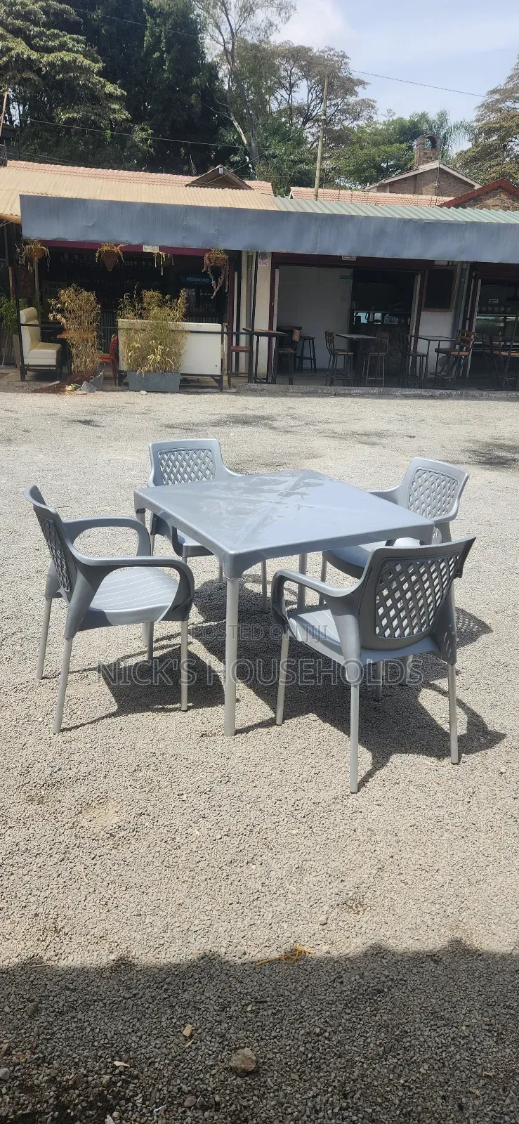 4 Quality Plastic Chairs for Hotel With a Table Set